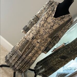 Elegant Black and Cream Patterned Dress